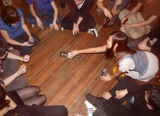 Spin the Bottle: A Game of Truth, Dare, and Laughter