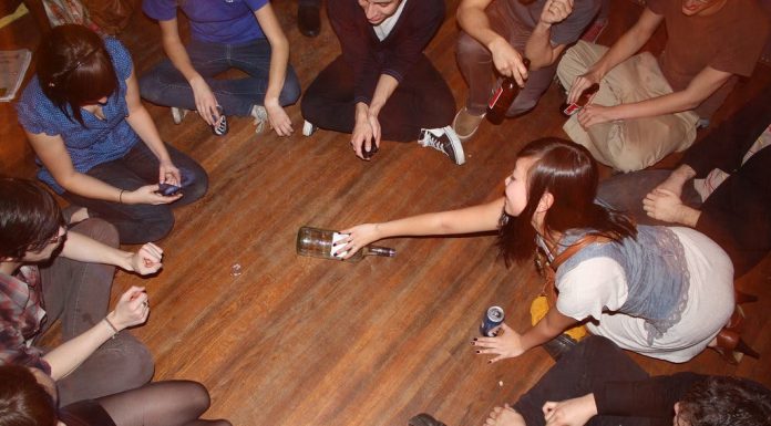 Spin the Bottle: A Game of Truth, Dare, and Laughter